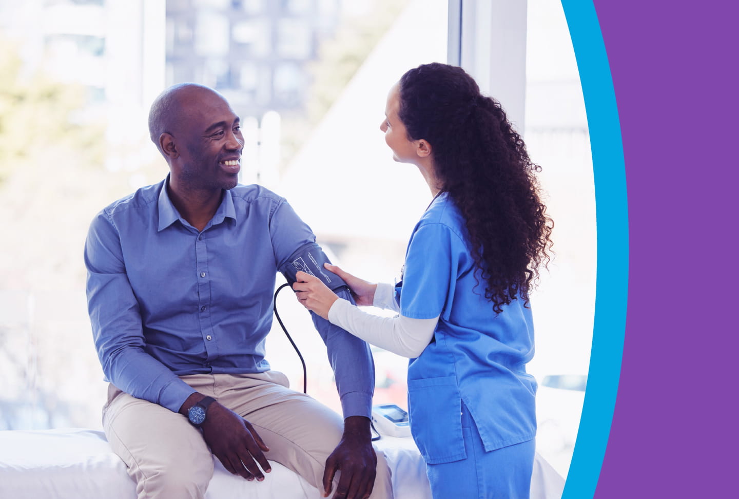 Provider checking patient's blood pressure