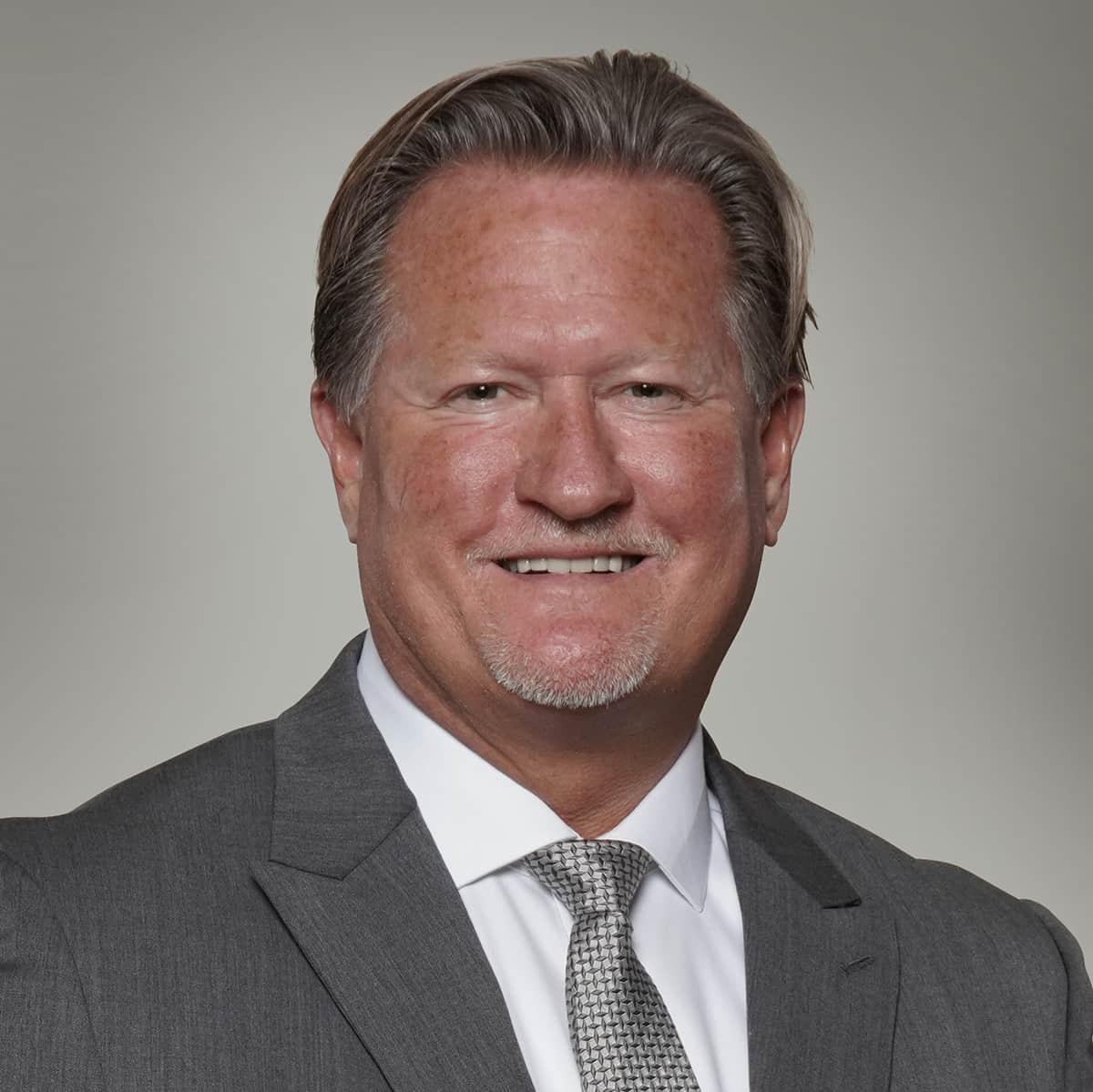 A smiling headshot of Jay Cunningham.