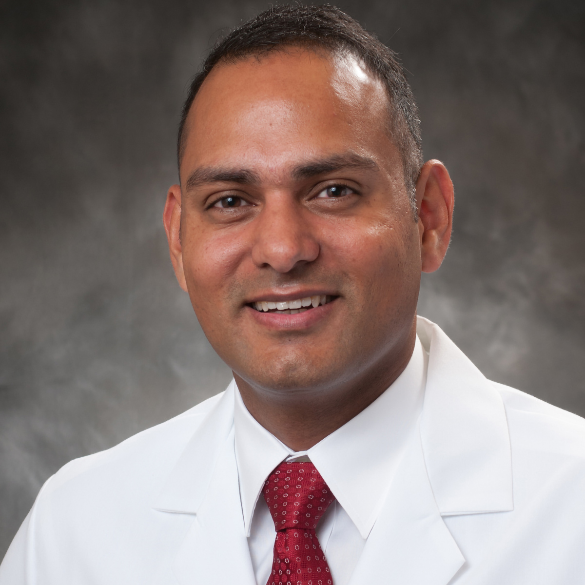 A friendly headshot of Sartaj Sanghera, MD